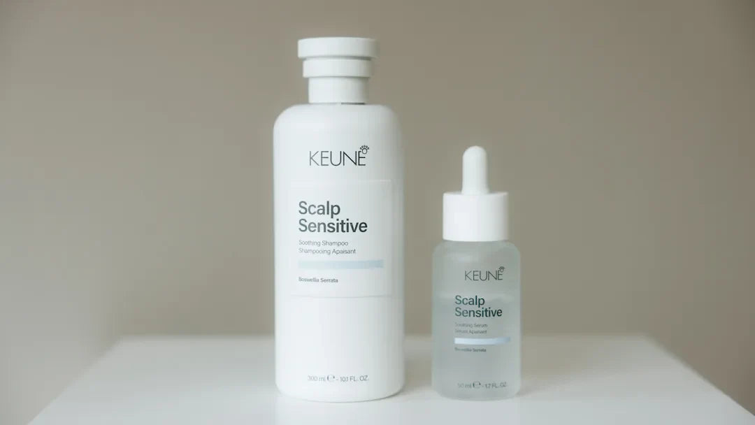 Keune scalp sensitive product range in bottles on white table