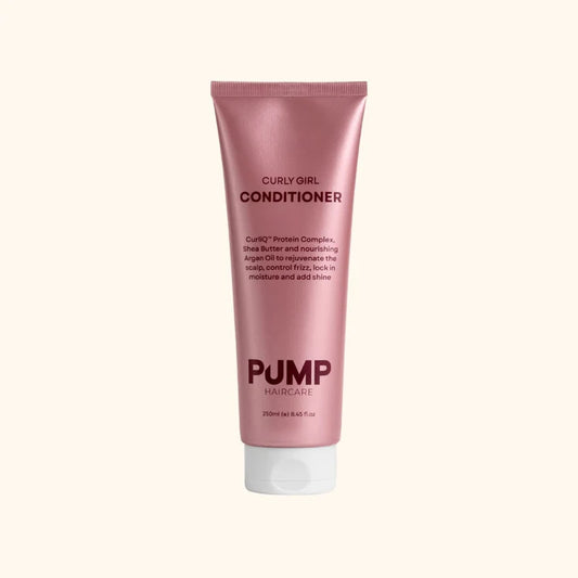 Pink tube of Curly Girl Conditioner on a white background