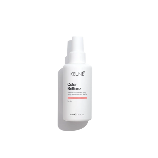 Keune Color Brillianz spray bottle on a white background