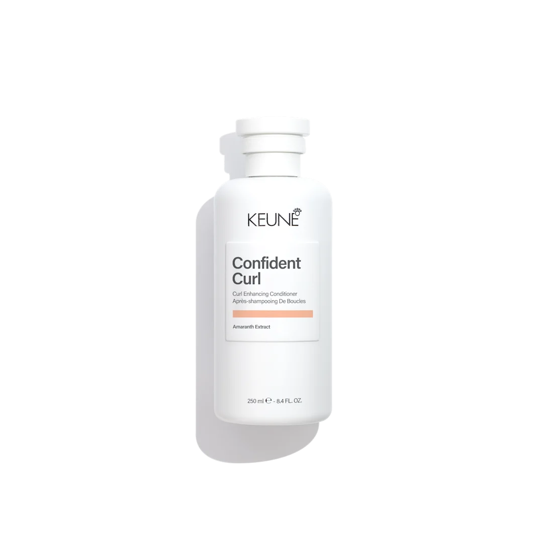 Keune confident curl conditioner in white bottle with white background