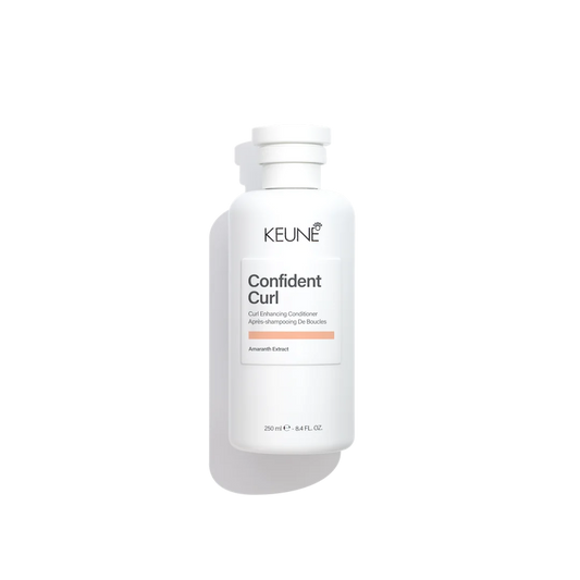 Keune confident curl conditioner in white bottle with white background