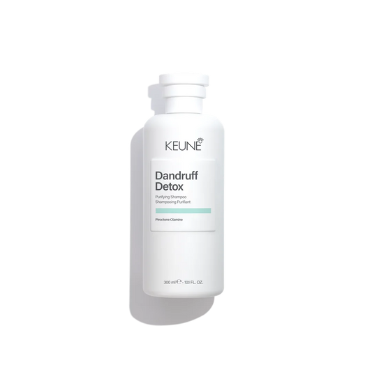 Keune Dandruff Detox shampoo in white bottle with white background