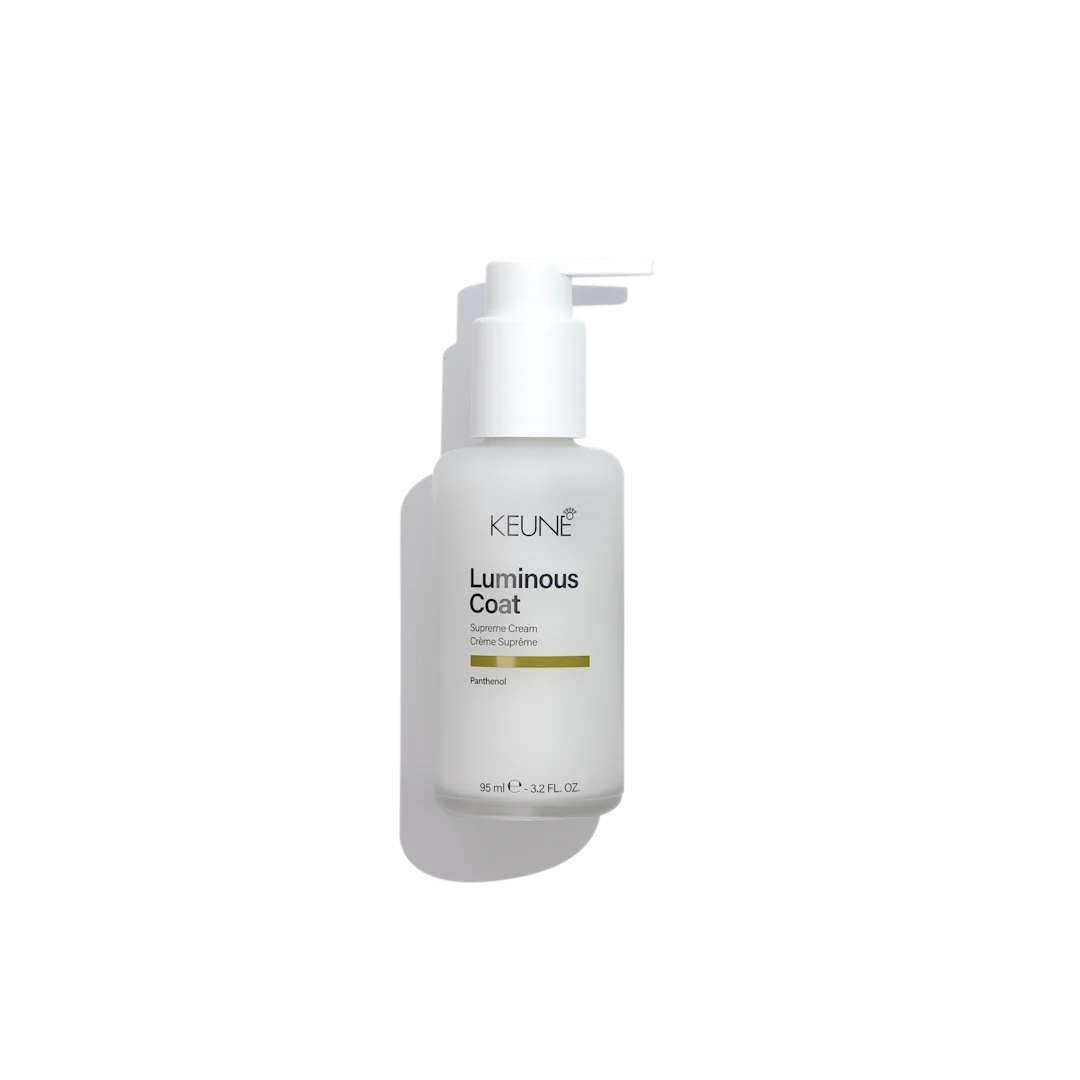 Keune Luminous Coat hair product bottle on a white background