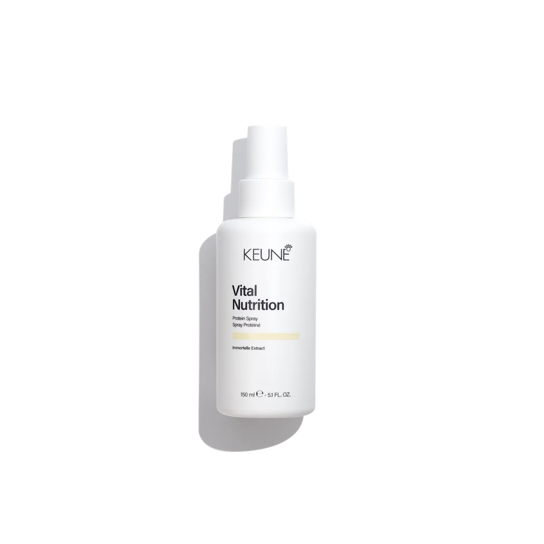 keune vital nutrition spray bottle with white background