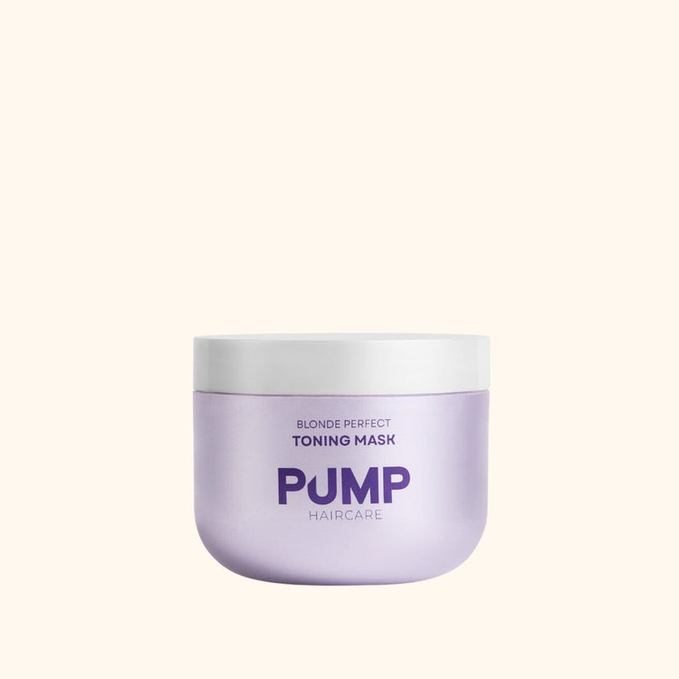 Purple hair mask jar with 'PUMP Haircare' branding on a white background